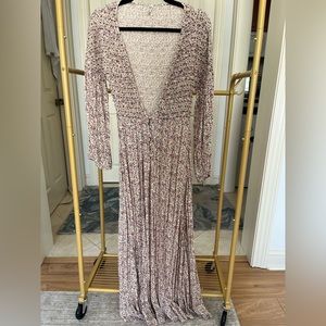 Like new- Free People v-neck dress/over dress. Bead detailing. Floral pattern